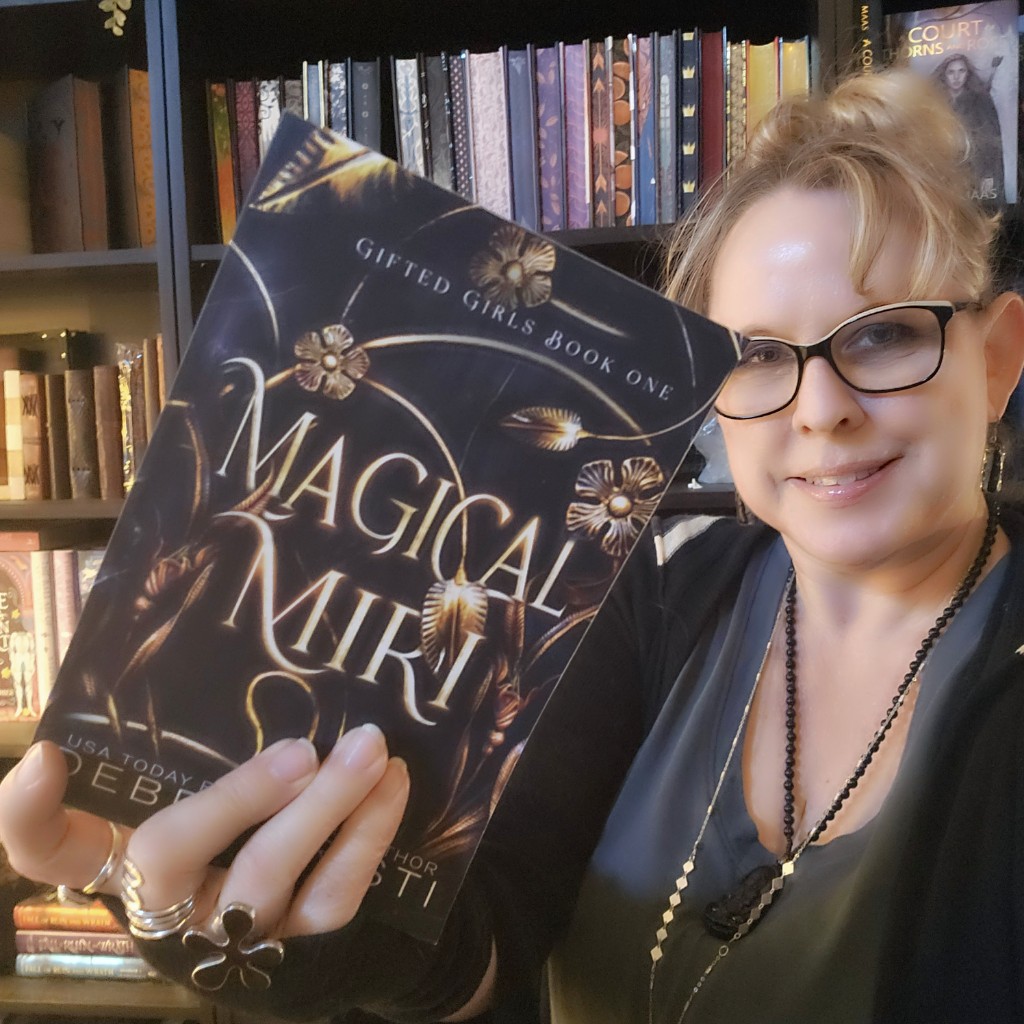 Magical Miri book held by author